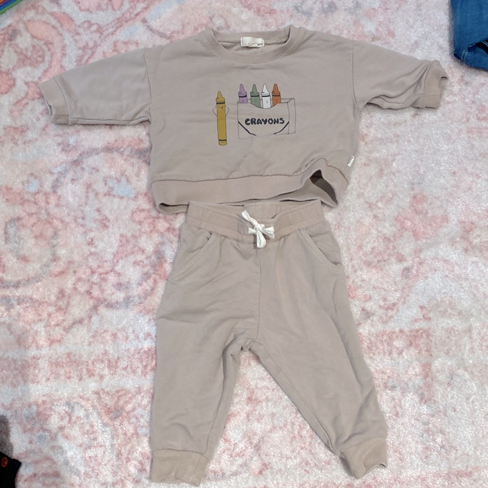 Greige baby sweatsuit.